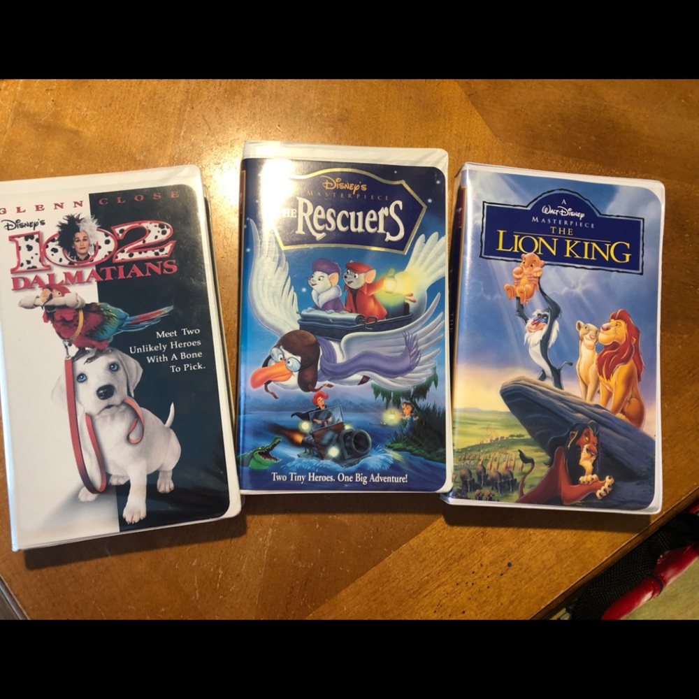 Disney VHS Trio - The Lion King, The Rescuers, and 102 Dalmatians.